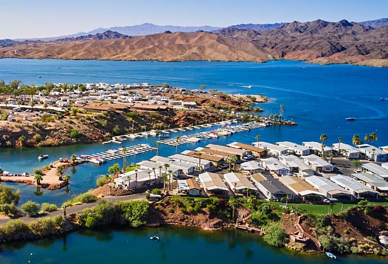 Illustration of a couple shopping online for a mobile home